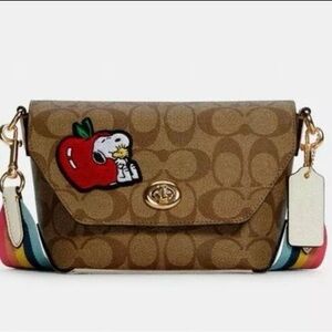 Coach X Peanuts Karlee
Crossbody In Signature Canvas With Snoopy.  *Rare!"